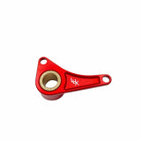 A bred billet aluminum shift shaft brace with bronze bushing, featuring the brand name 'LUX' engraved on it.